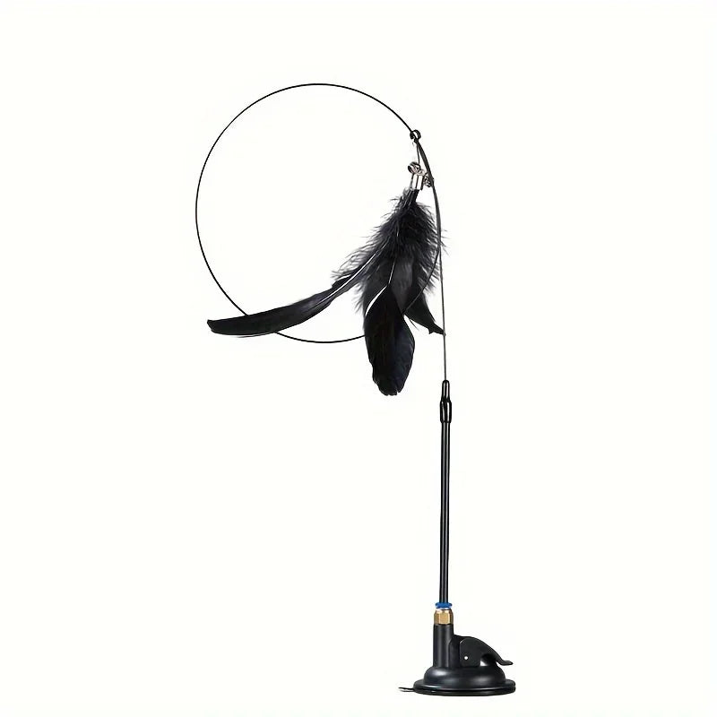 Black cat toy wand with hoop and feathers on a white background