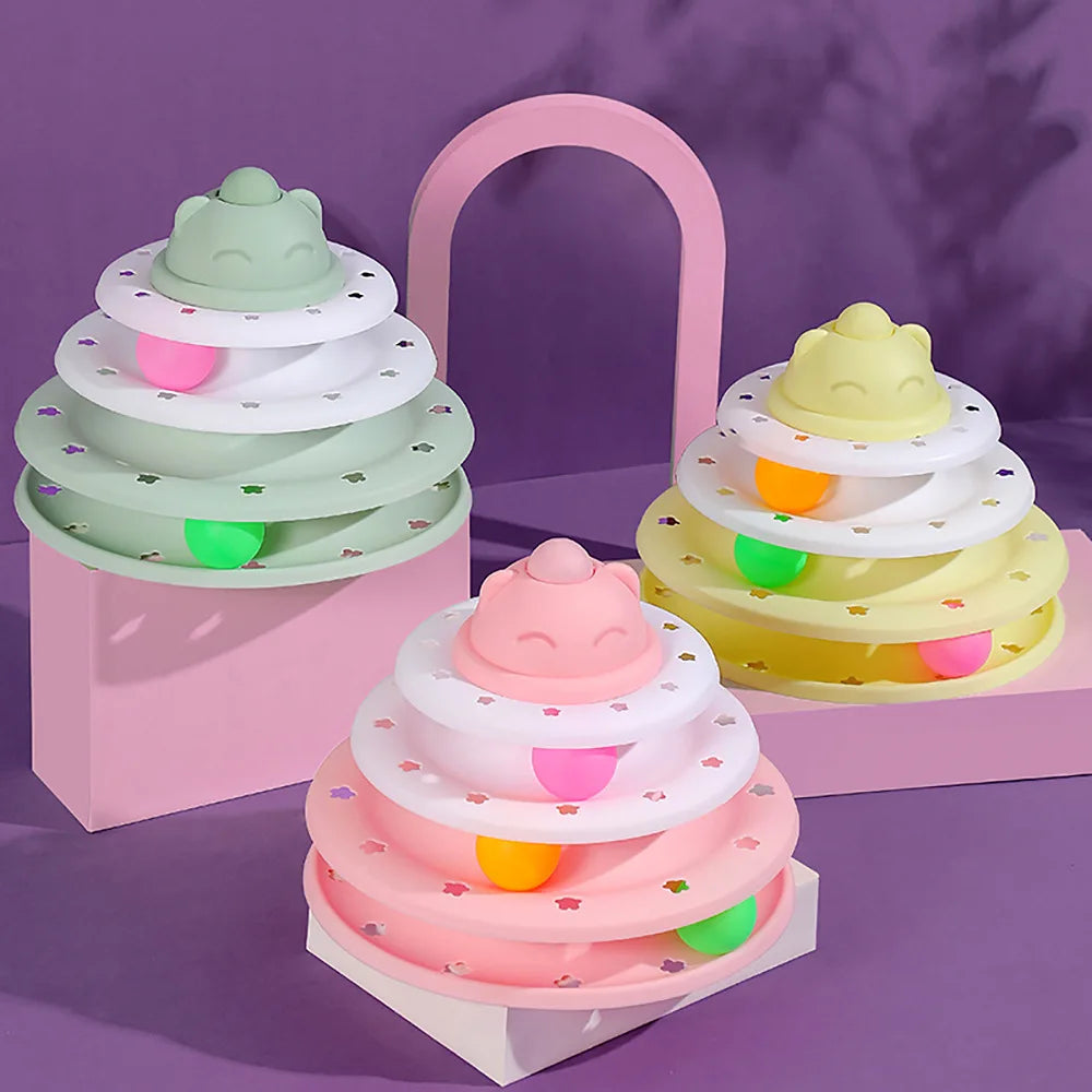 Colorful toy tiered structures on a purple background
