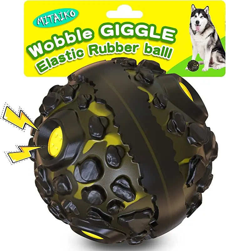Black and yellow wobble giggle elastic rubber ball for dogs on a white background