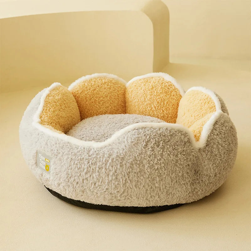Round pet bed with beige interior and white exterior on a beige background