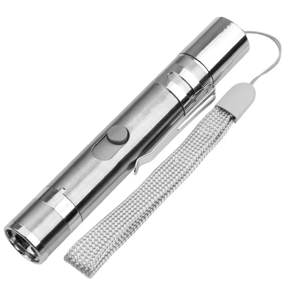 Metallic flashlight with textured grip on a white background