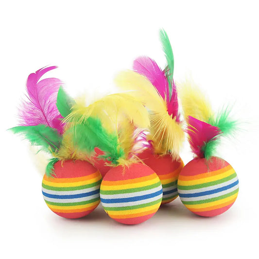Colorful striped balls with feathers on a white background