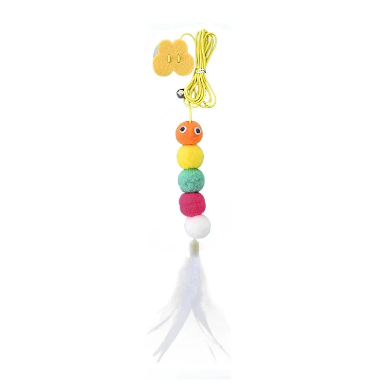 Colorful beaded cat toy with a string on a white background