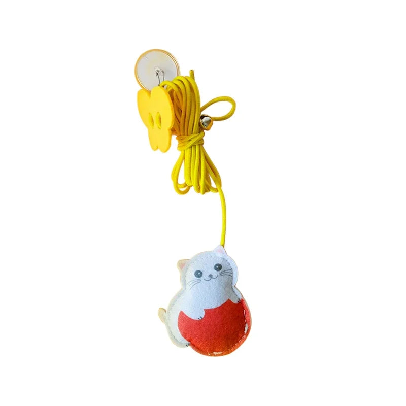 toy with a yellow string on a white background